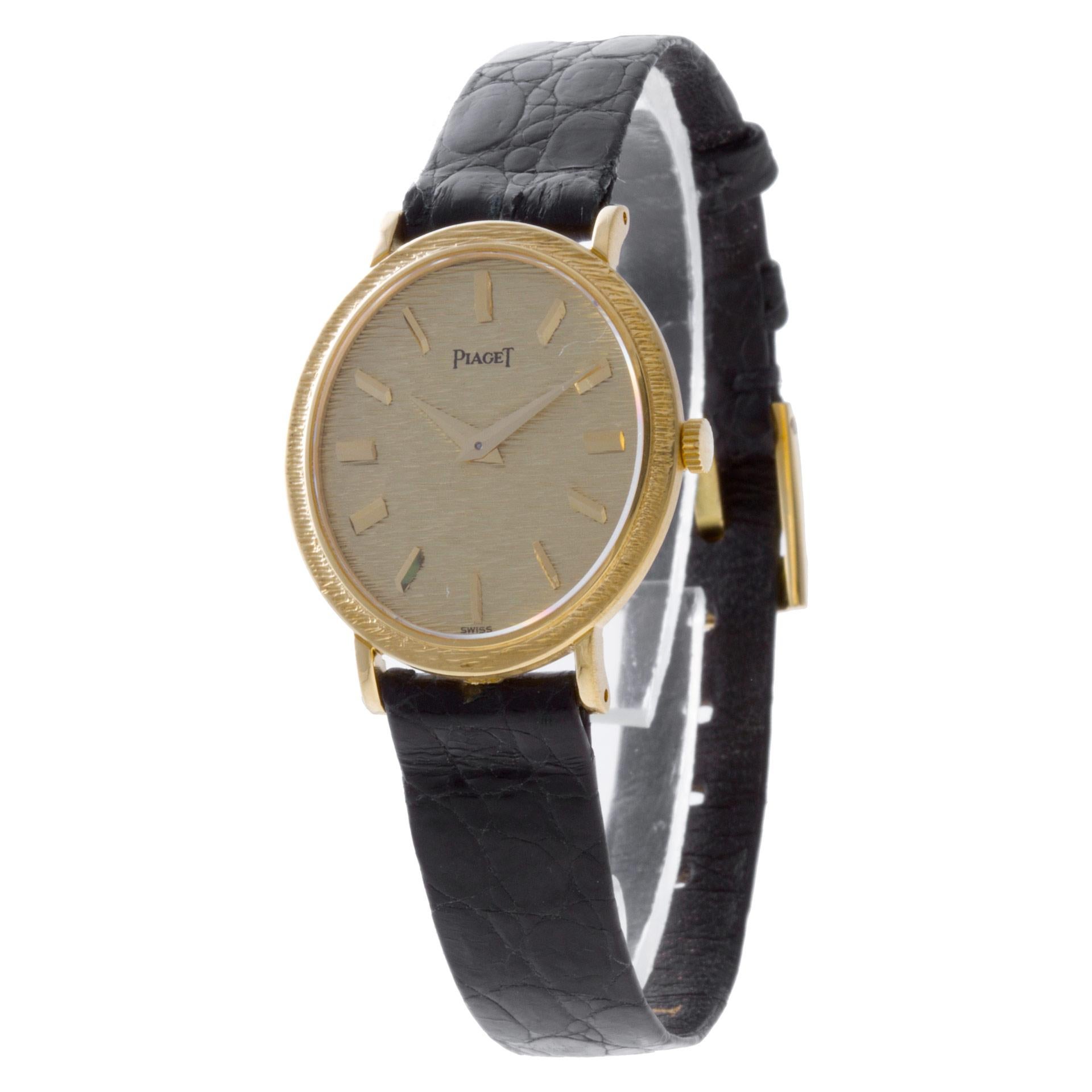Ladies Piaget Oval watch in 18k on the leather strap with original 18k tang buckle. Manual. With original box and papers dated 1978. Ref 9821. 17mm x 27mm case size. Fine Pre-owned Piaget Watch.   Certified preowned Classic Piaget Oval 9821 watch is