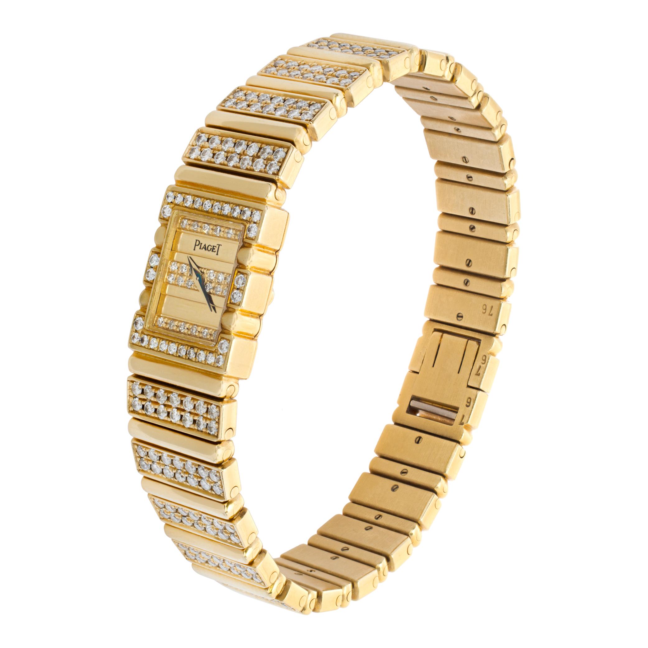 Ladies Piaget Polo in 18k yellow gold with factory original diamonds on the dial, case, and bracelet. Quartz. Ref 15201C727. 14mm x 17mm Will fit up to a 6.75