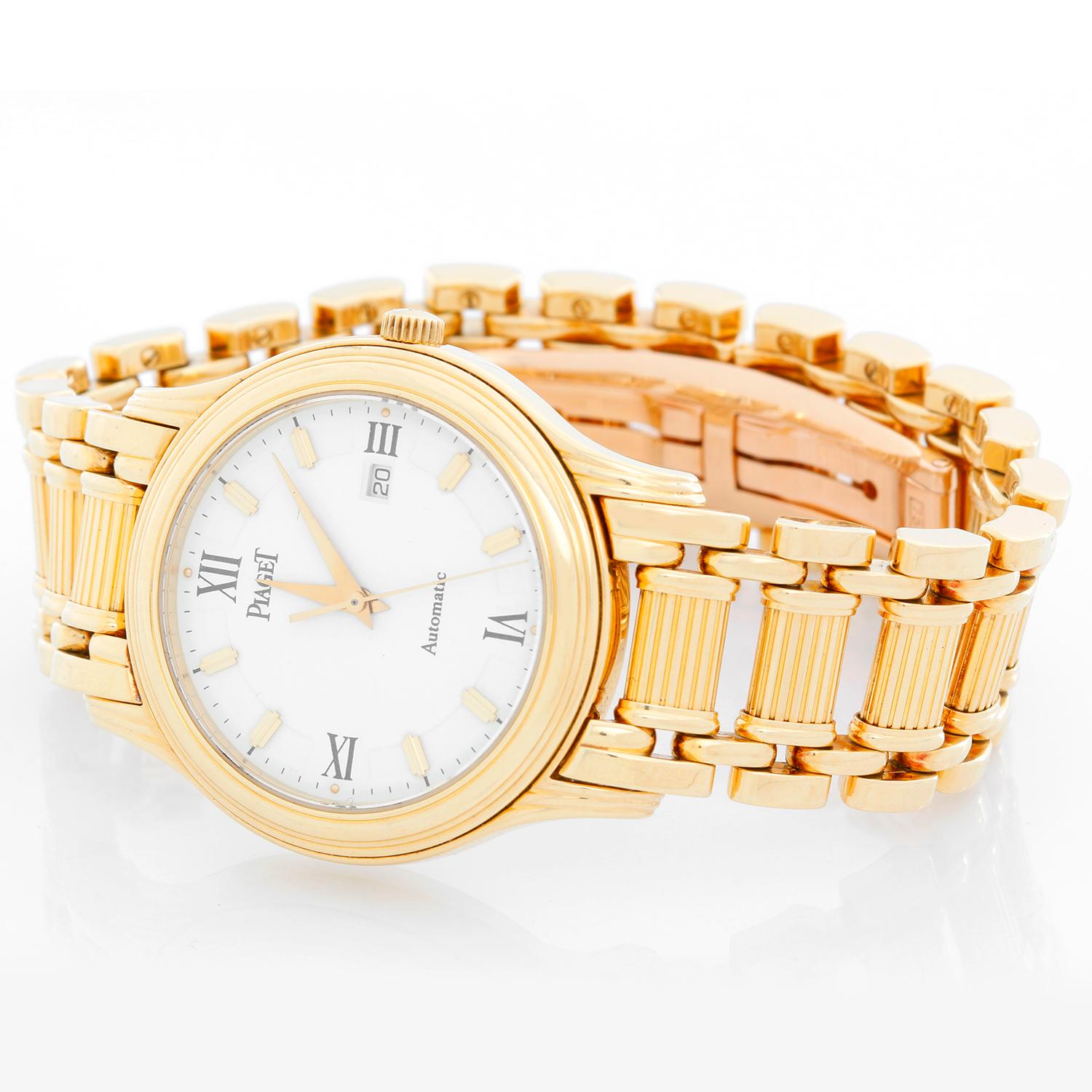 Piaget Polo 18K Yellow Gold Midsize Watch - Quartz. 18K Yellow gold ( 33  mm ). White dial with gold markers and black Roman numerals. 18K Yellow Gold Piaget Bracelet with 18K Yellow gold deployant clasp. Pre-owned with custom box.