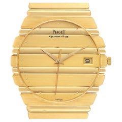 Piaget Polo 18K Yellow Gold Champagne Dial Mens Watch 15561