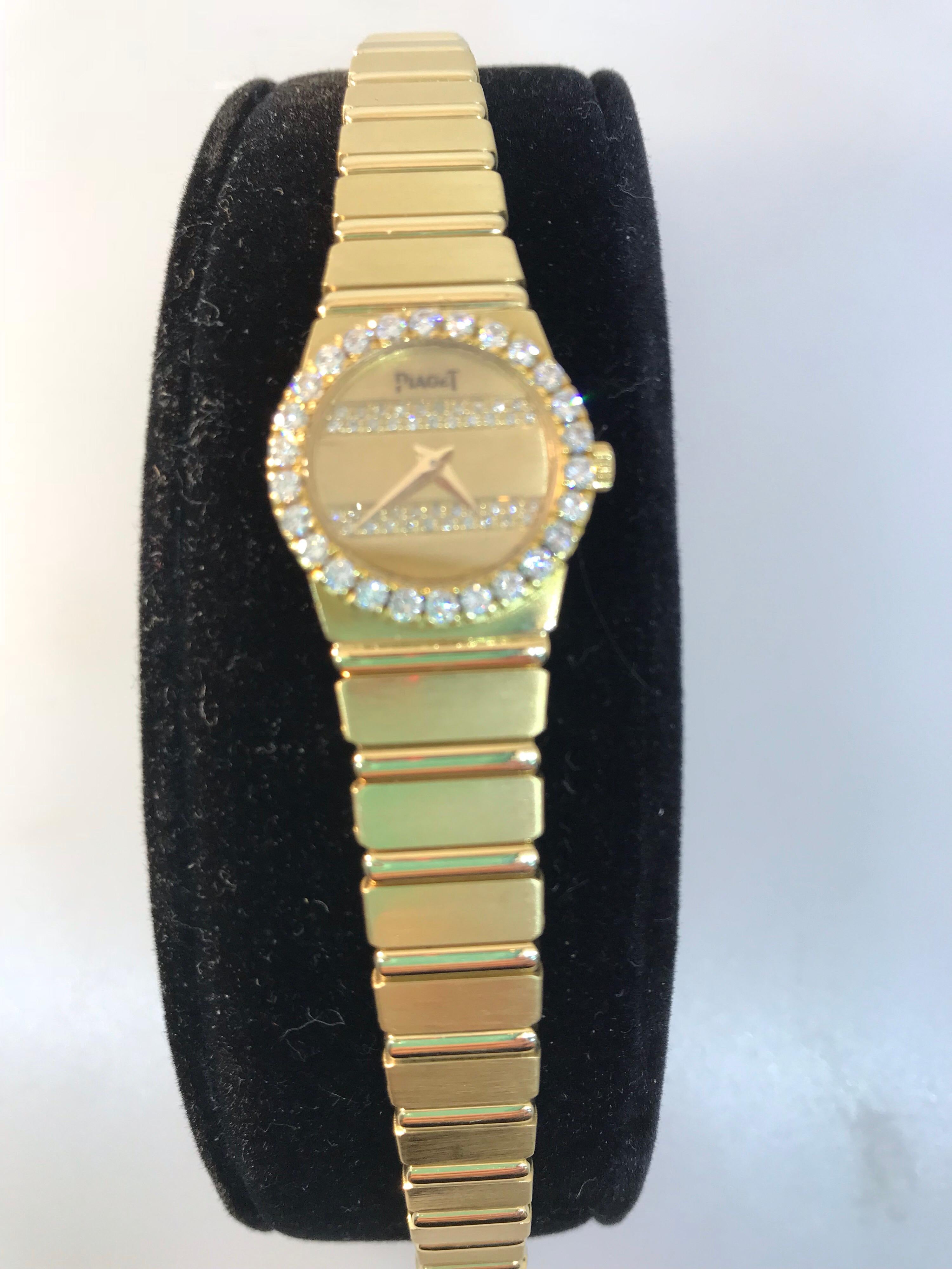 Piaget Polo Ladies Watch

Model Number: 8296

100% Authentic

Preowned in Excellent Condition

Comes with a generic watch box

18 Karat Yellow Gold Case & Bracelet

Factory Diamond Bezel

Gold Dial set with factory diamonds

Gold Tone Hour