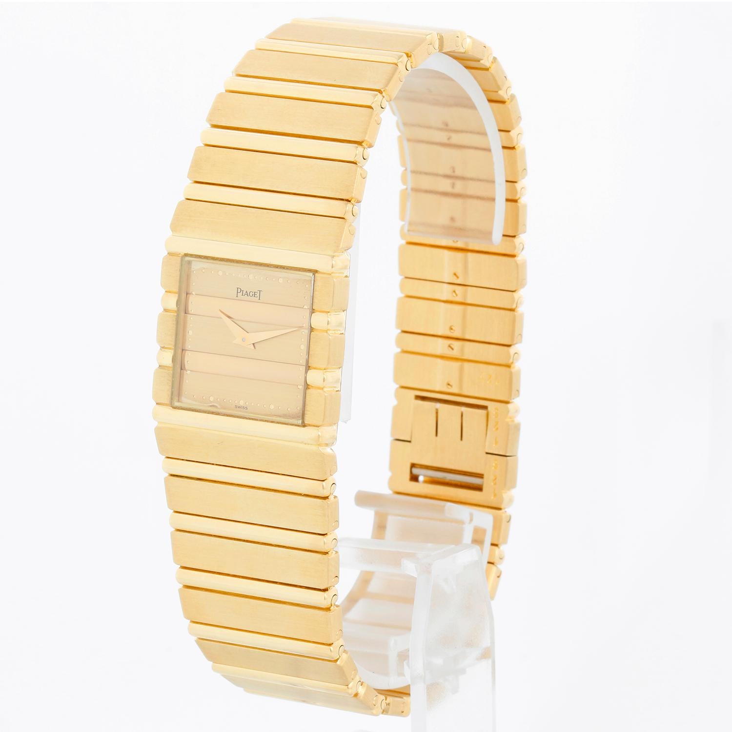 Piaget Polo 18K Yellow Gold Men's Watch 7131 C701 - Quartz. 18K Yellow Gold ( 25 x 25 mm ). Gold dial with round hour markers. 18K Yellow Gold bracelet. Pre-owned with Piaget box, service papers, and original purchase receipt.