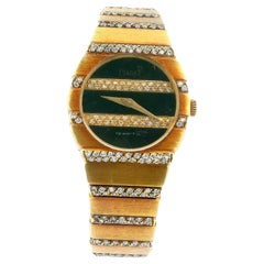 Reloj de señora Piaget Polo de oro amarillo de 18 quilates con esfera de ónice y diamantes y brazalete de diamantes