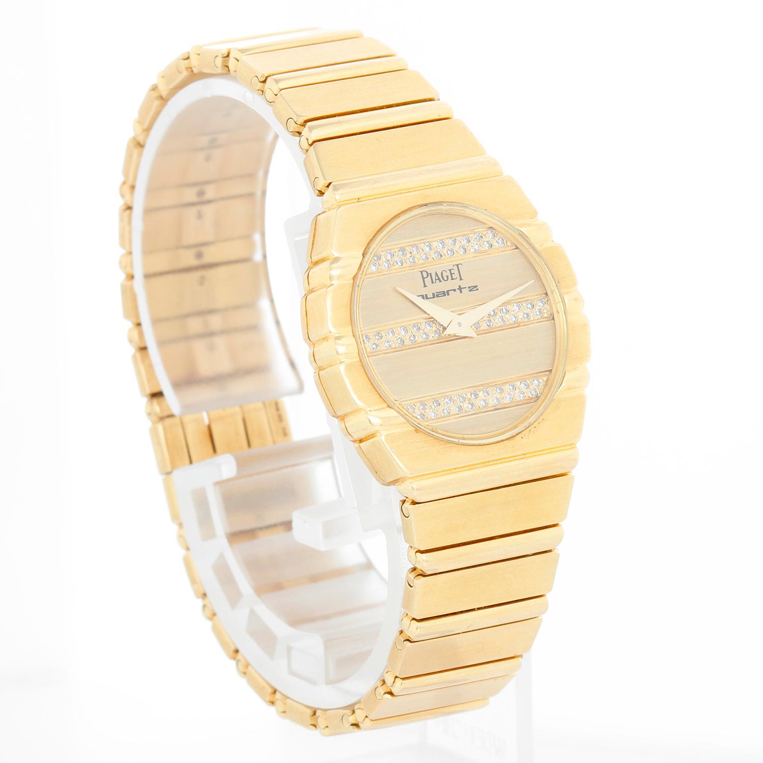 Piaget Polo 18K Yellow Gold Pave Diamond Ladies Watch  761 C701 - Quartz. 18K Yellow Gold ( 27 mm). Gold dial with pave diamonds. 18K Yellow Gold bracelet; will fit up to 6-1/4 inch wrist. Pre-owned with custom box. 