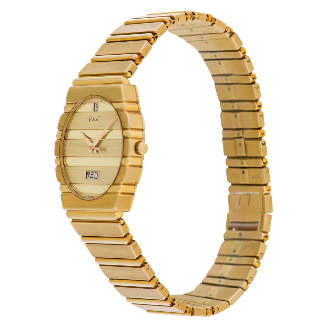 Piaget Polo in 18k. Quartz with sweep seconds, date and day. Ref 15562C701. Fits 7.5 inches wrist. Circa 1980's. Fine Pre-owned Piaget Watch.

Certified preowned Dress Piaget Polo 15562C701 watch is made out of yellow gold on a 18k bracelet with a