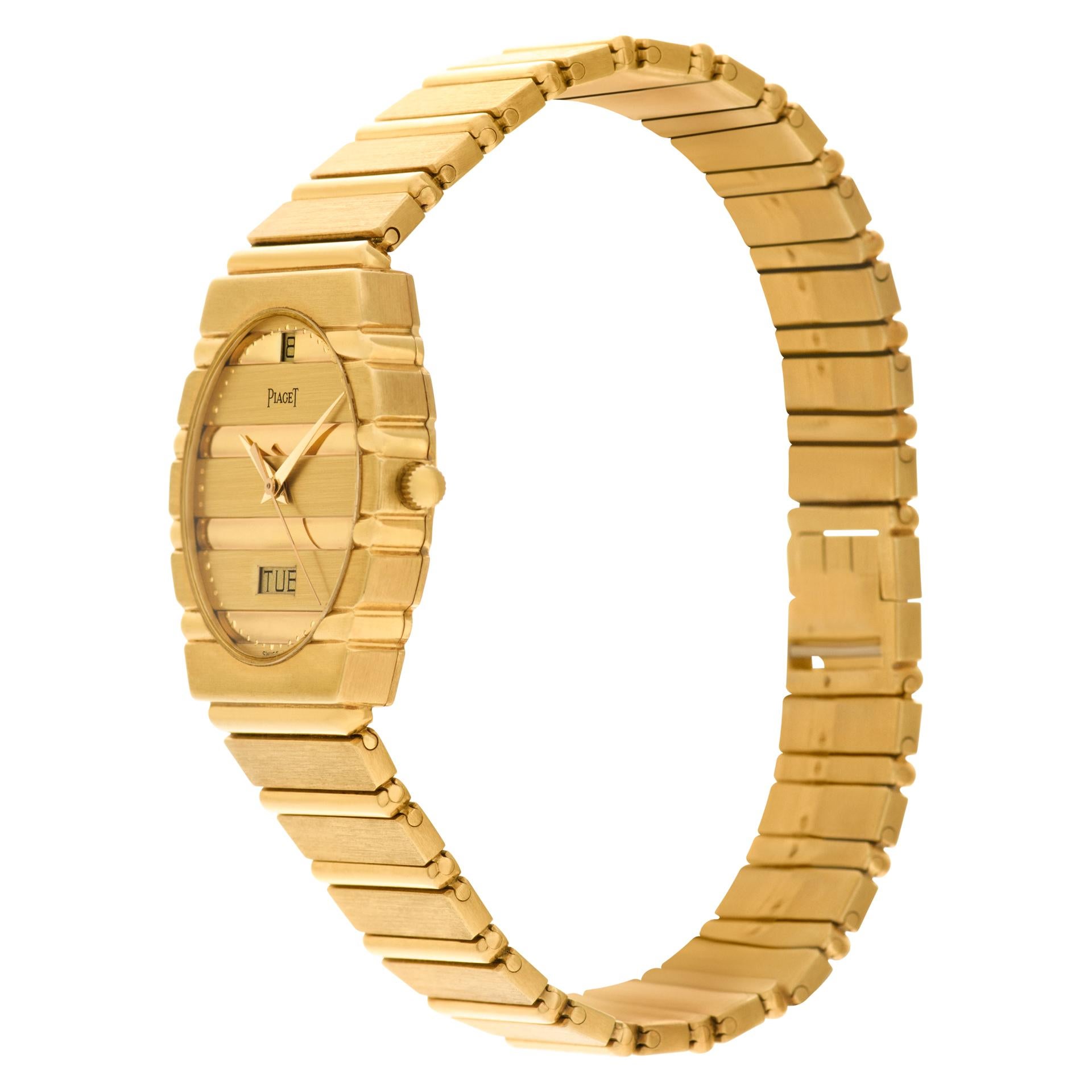 Piaget Polo in 18k yellow gold. Quartz w/ sweep seconds, date and day. 31 mm case size. Ref 15562c701. Circa 1980's Fine Pre-owned Piaget Watch. Certified preowned Dress Piaget Polo 15562c701 watch is made out of yellow gold on a 18k bracelet with a