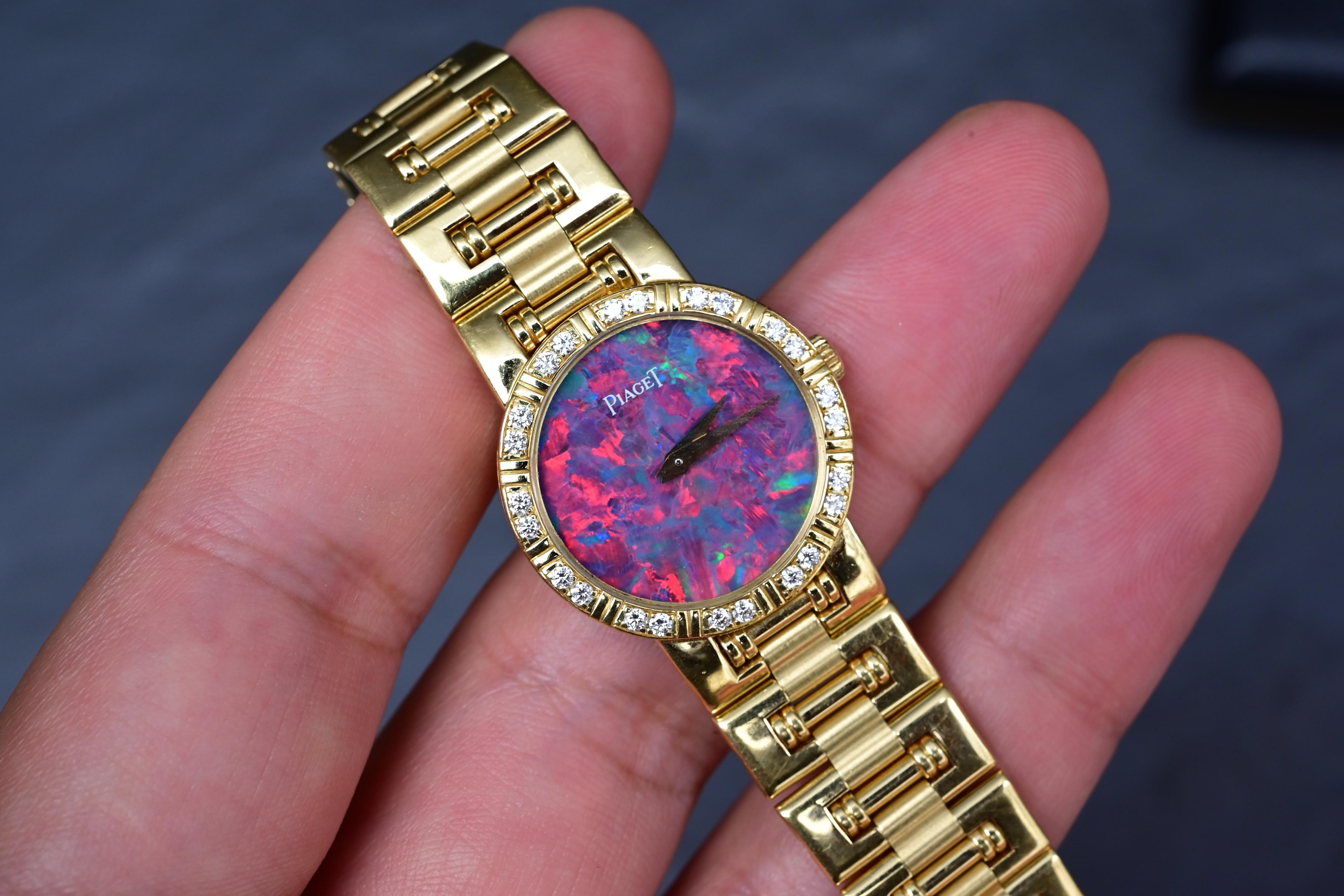 Title:
 Piaget Polo 80564 K81 Ladies Quartz Watch in 18K Gold with Black Opal Dial & Diamonds, 60.73g

Description:

 A rare and breathtaking luxury timepiece, this Piaget Polo ladies quartz watch (Model 80564 K81) is crafted entirely in solid 18K