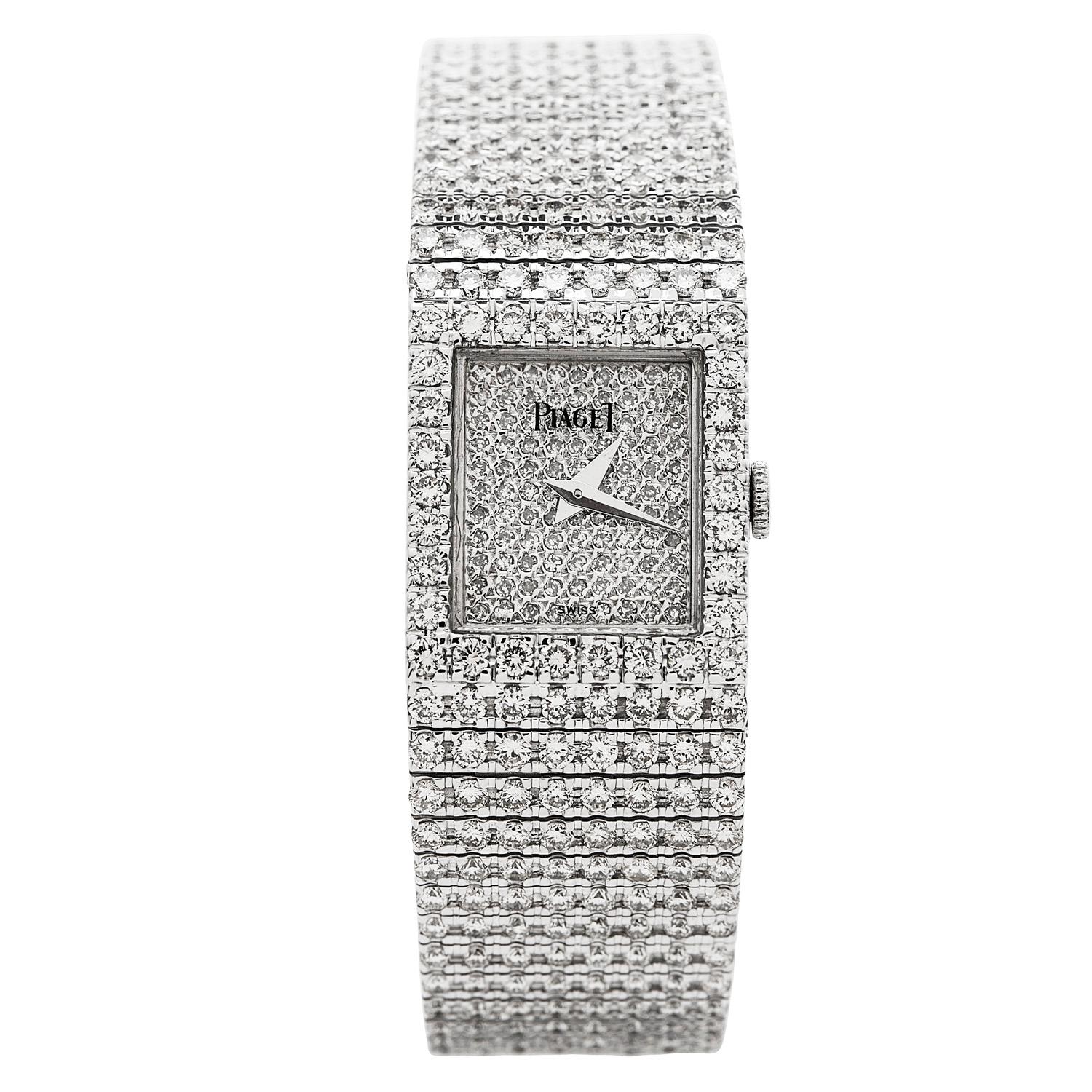 This Pristine Condition preowned 21st century Piaget POLO all diamond watch is the perfect glamour piece. 
Crafted in pure 74.5 grams of 18K White Gold. Featuring all original factory-set diamonds,  dial with 110 round brilliant cut diamonds, 36 