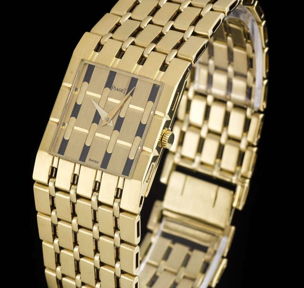 A 23 mm 18k Yellow Gold Polo Gents Dress Wristwatch, champagne dial, a fixed 18k yellow gold bezel, an 18k yellow gold bracelet with an 18k yellow gold jewellery style clasp, mineral glass, manual wind movement, in excellent condition, comes with a