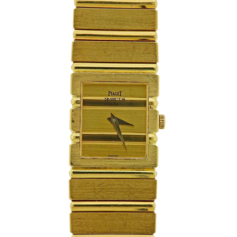 Classic 18k yellow gold Piaget Polo watch, featuring gold Piaget signed dial with gold hands. 18k gold Piaget band is 7