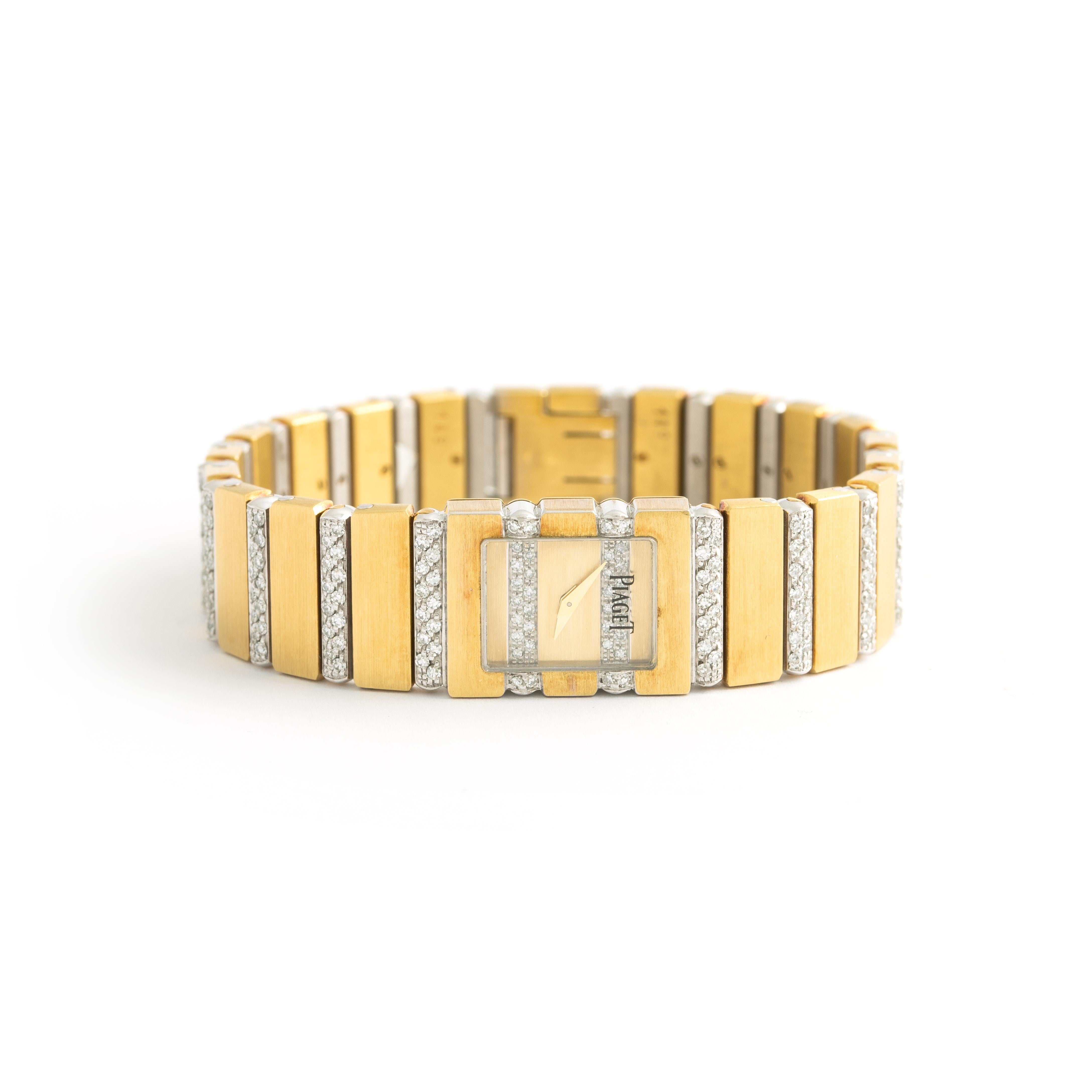 Piaget Mini Diamond Yellow Gold 18K - Quartz. 
Or jaune 18K ( 14 x 18 mm ).
Longueur : 16.00 cm
Largeur du bracelet : 11 mm. à 14 mm.
Boîte contemporaine Piaget.

Poids total : 72,25 grammes

Nous ne garantissons pas que le mouvement fonctionne.
