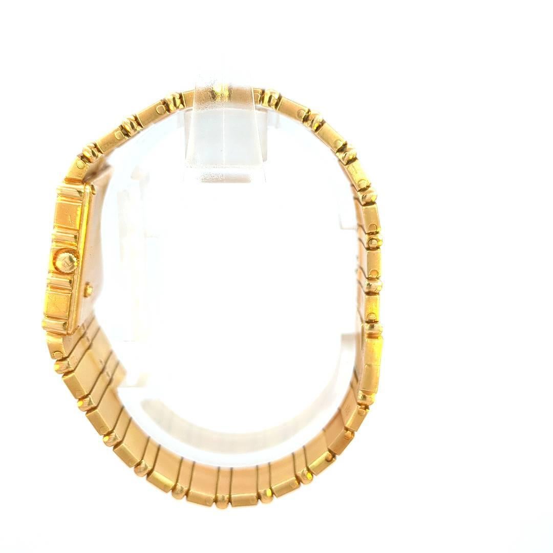 The Piaget Gold Watch offers a stunning combination of luxury, sophistication, and precision. Crafted with the finest materials, this timepiece exudes elegance and exclusivity. Made from 18k gold, its warm and radiant tones complement any attire