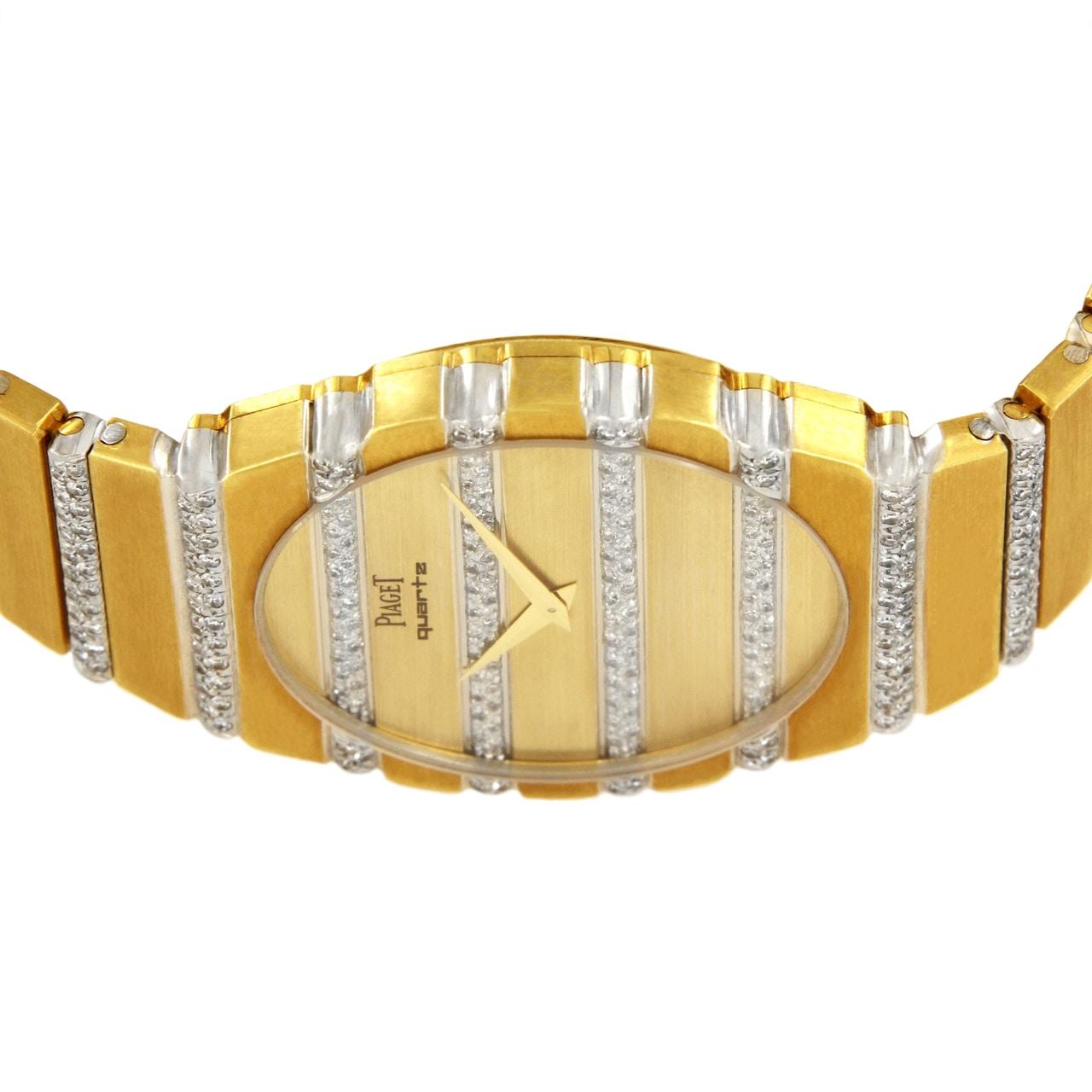 PIAGET POLO TWO TONE GOLD & DIAMOND WATCH 367758

-Condition: Mint 
-Material: 18k Yellow Gold & 18k White Gold & Diamonds
-Case size: 34mm
-Movement: Quartz
-Dial: Gold, diamond set
-Crystal: Sapphire
-Clasp: Fold over
-Weight: 145gr
-Length: