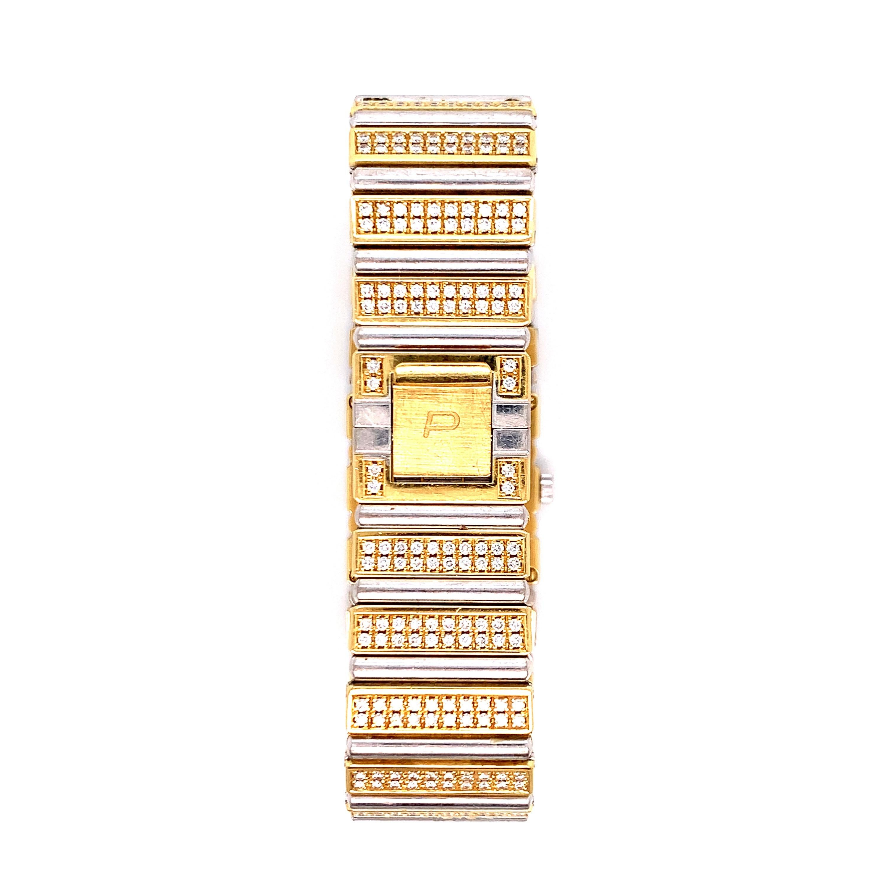 An 18 karat two-tone gold (yellow and white) diamond Piaget 'Polo' wrist watch. The diamonds weigh approximately 6 carats and are present throughout the whole watch, including in the square dial, which has black enamel. The movement is quartz.