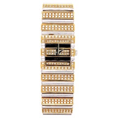 Piaget Montre Polo en or bicolore et diamants