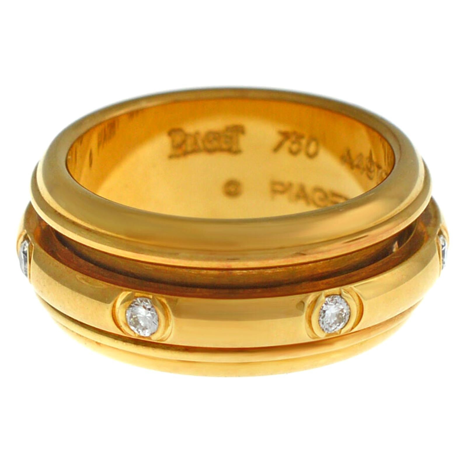 Piaget Possession 18 Karat Yellow Gold 14 Grams Diamond Rotating Ring For Sale