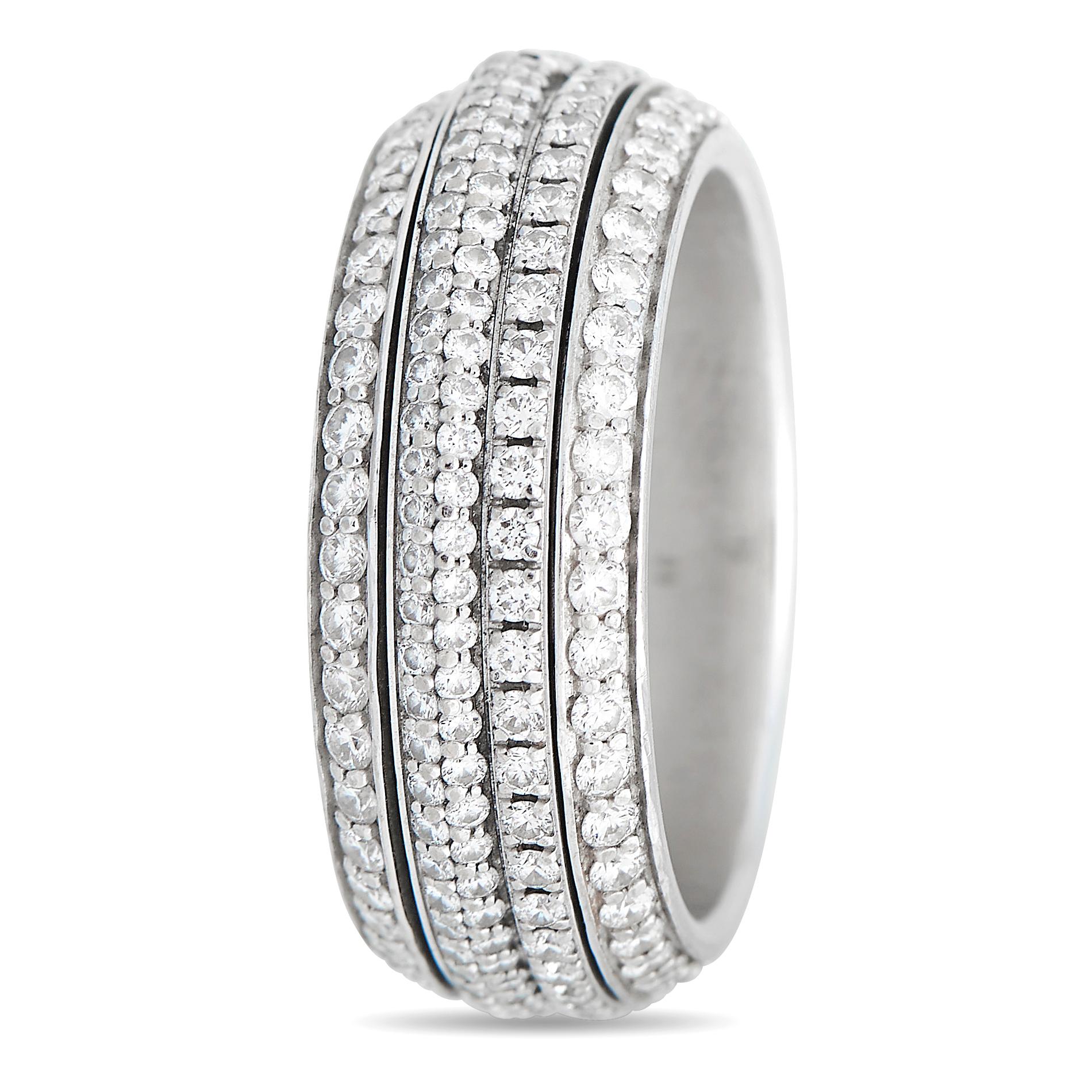 Luxurious and playful, this medium-model Possession Ring from Piaget sparkles and turns with grace and elegance. It features a wide band comprised of four slender asymmetric rings put together, with central rings that can be rotated 360 degrees in