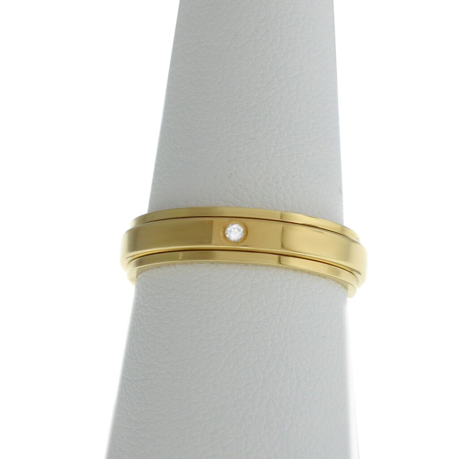 Brand	Piaget
Model	Possession
Gender	Ladies
Condition	New Old Stock
Metal 	18K Yellow Gold
Metal Weight	6 gr.
7.75 size	
This stunning Rotating Double Piaget ring is made from 18K Yellow Gold weighting at 6 gr. and has 1 diamonds.
