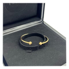 Bracciale rigido aperto Piaget Possession in oro giallo 18 carati con diamanti, misura 15