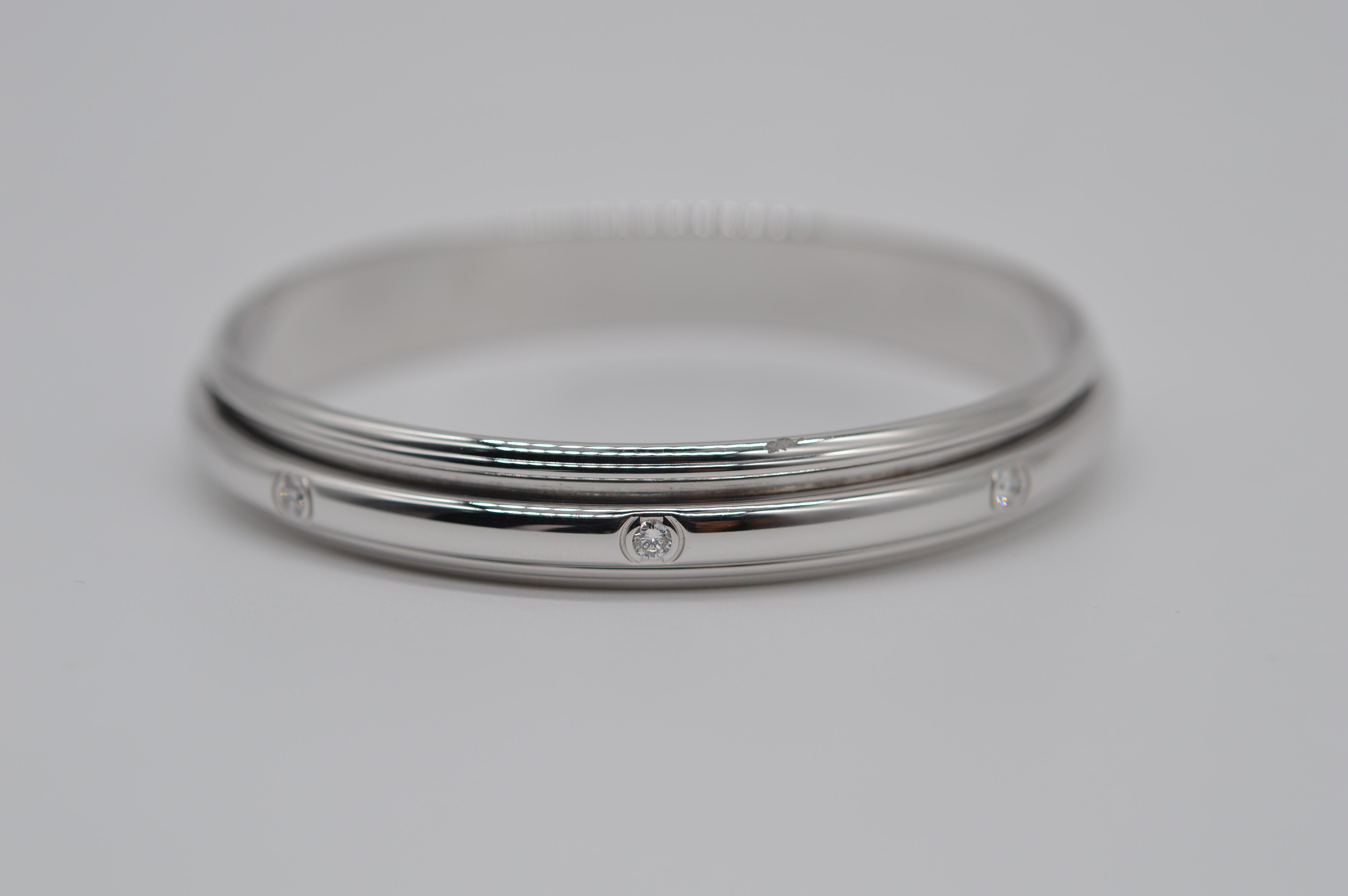 Piaget Possession Bangle Unworn
Size 65
18K White Gold
Weight 64.2 grams
Diamond Setting
Set with 8 Round Diamond for a total weight of 0.80 carats
Vintage unworn
From 1995

