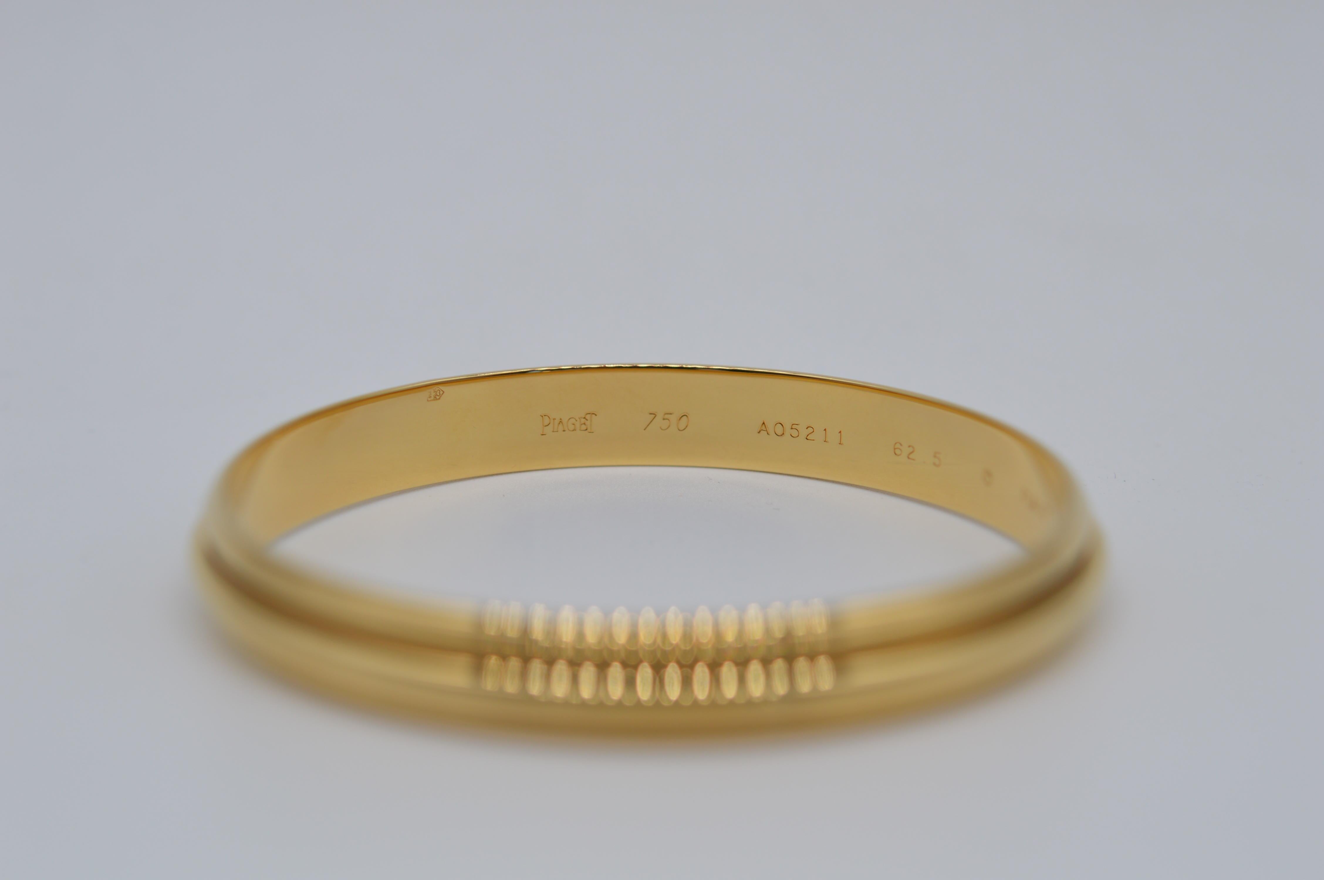 Piaget Possession Bangle Unworn
Size 62.5
18K Yellow Gold
Spinning bangle
Weight 48.5 grams
Vintage unworn
From 1990