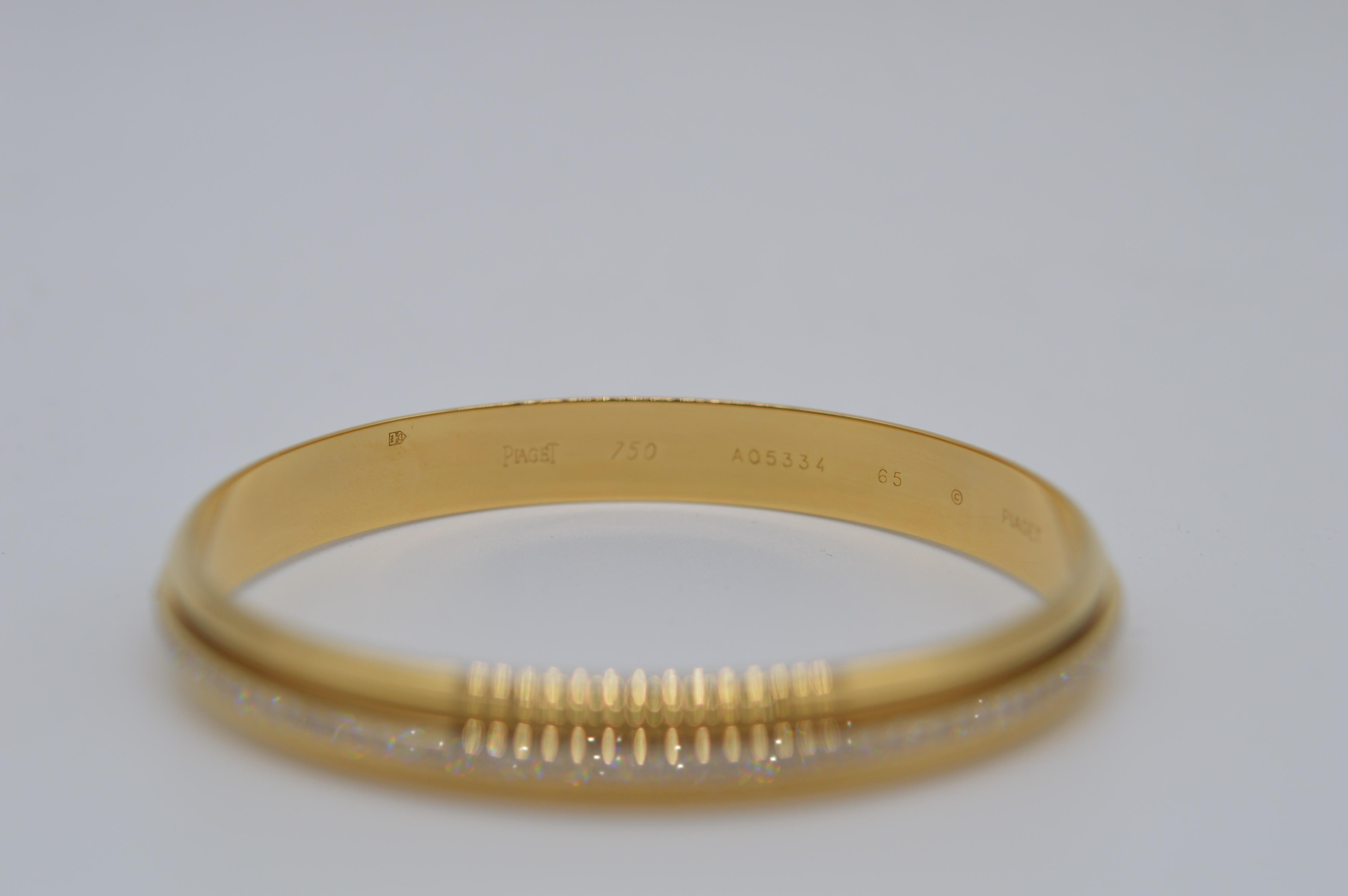 Piaget Possession Bangle Unworn
Size 65
18K Yellow Gold
Weight 48.2 grams
Diamonds Setting
Set with 116 Round Diamonds for a total weight of 1.78 carats
Vintage unworn
From 1990
