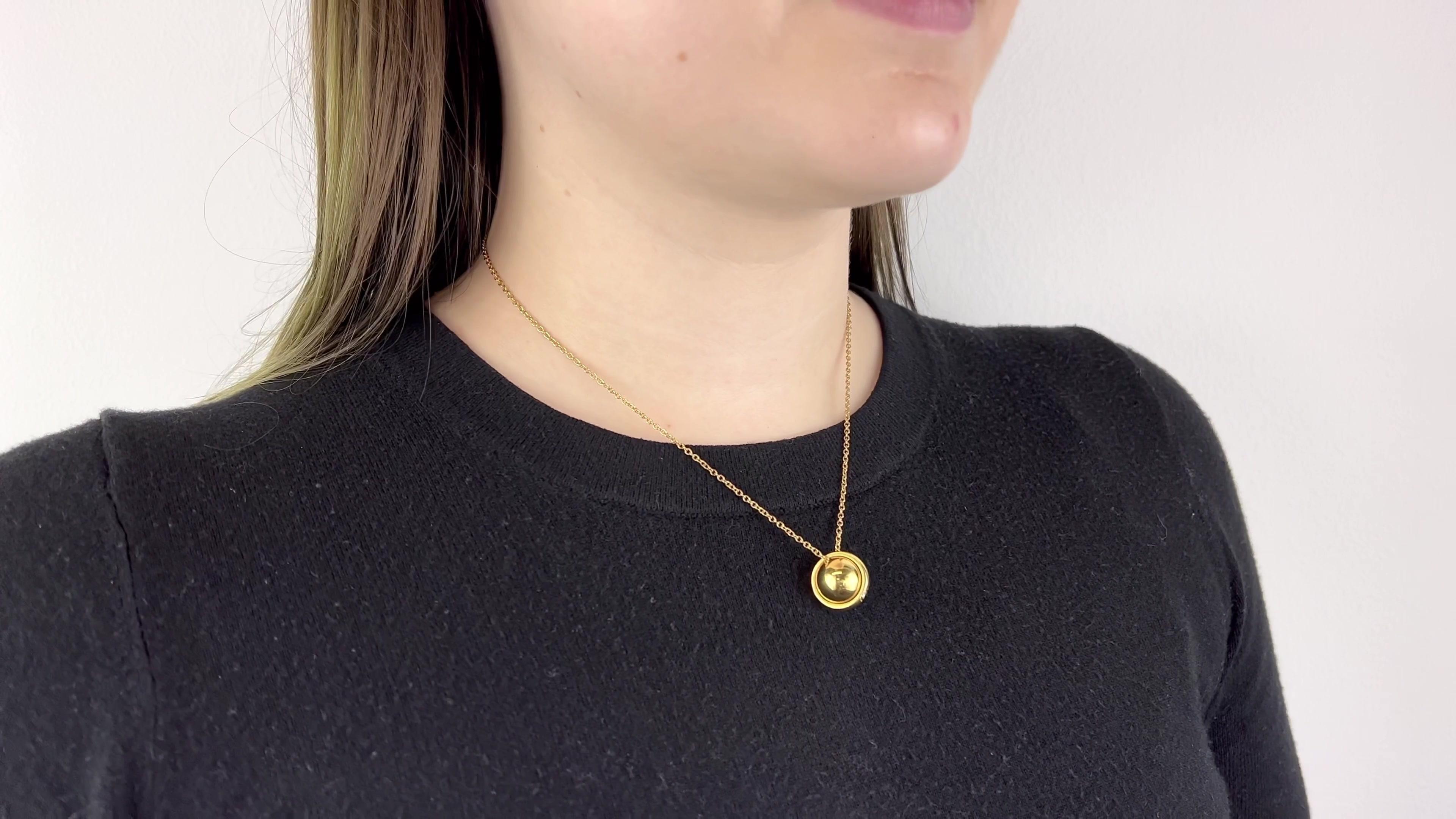 One Piaget Possession Diamond 18 Karat Gold Necklace. Featuring one round brilliant cut diamond of approximately 0.45 carat, graded D color, VVS clarity. Crafted in 18 karat yellow gold, signed Piaget, #B7S222, with Italian hallmarks. Circa 2000s.