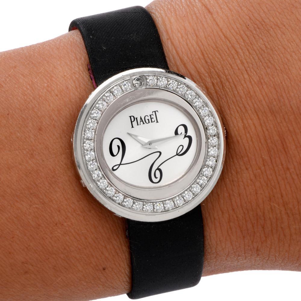 Piaget is famous for making elegant watches. 
Model: Possession 
Movement: Quartz (battery) working
Measurement: 29mm 
Case: 18-karat white gold
Dial: Silver 
Bezel: 37 Factory set round-diamond, approx 0.72 carats E-F color, VVS Clarity
Sapphire