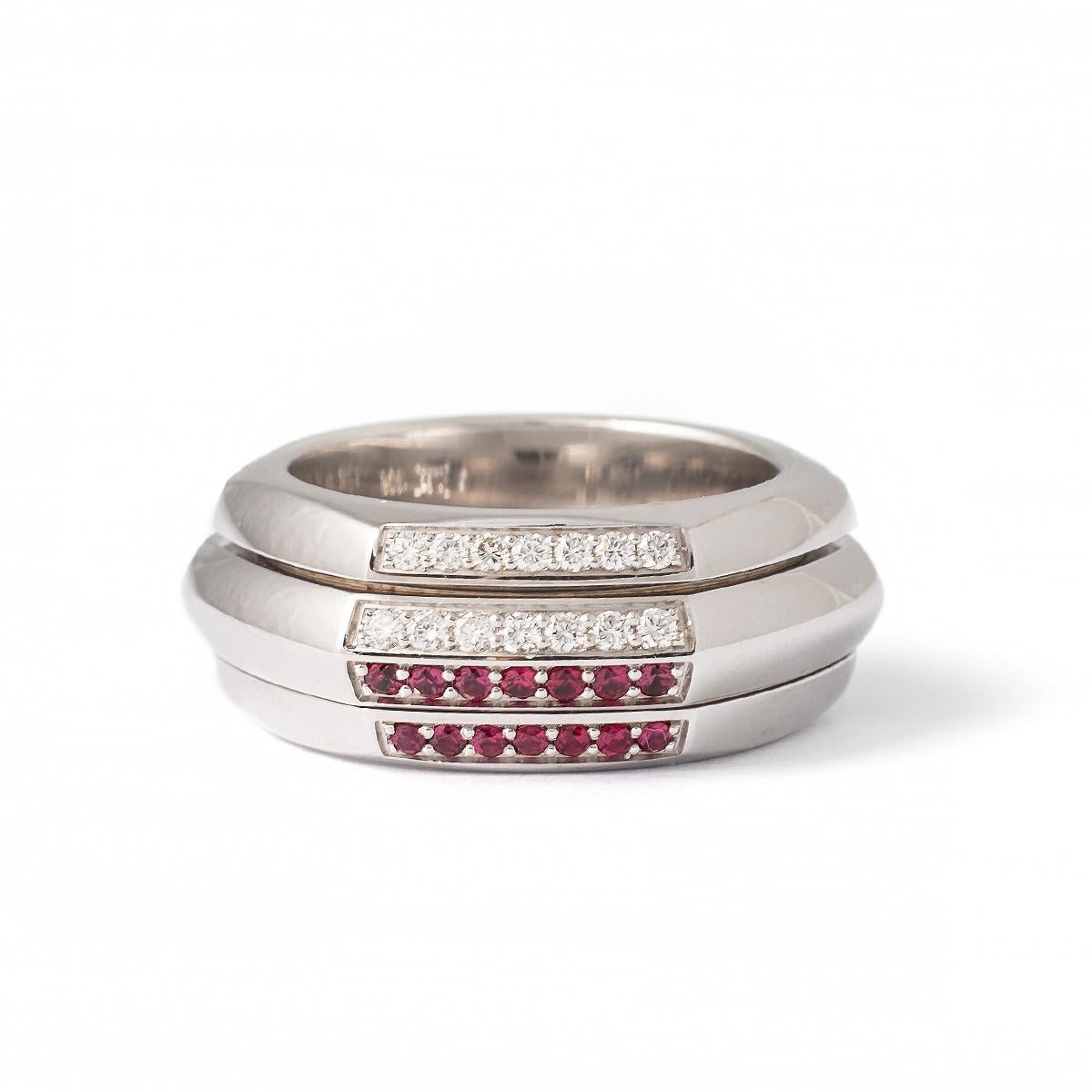 Piaget Possession Diamond and Ruby White Gold band Ring.
Numbered A73335.
Signed Piaget.
Date 1998.
Ring size: 55.