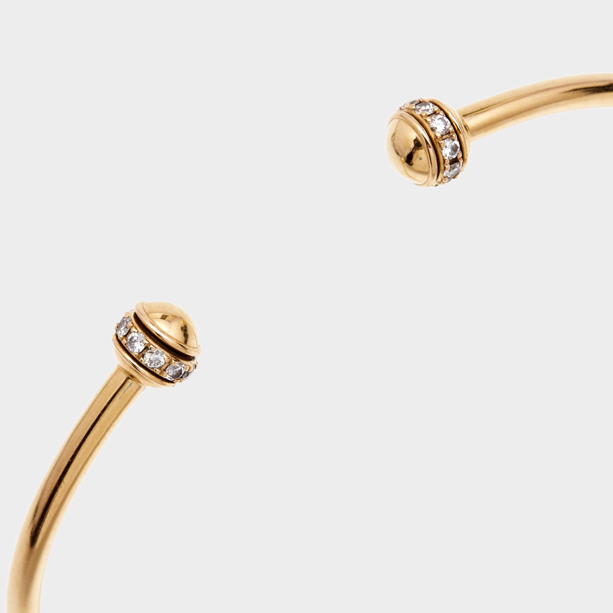 Show your love for fine artistry and luxury accessories with this stunning open-cuff bracelet from Piaget that is made from 18k rose gold. One of its most popular collections from Piaget is Possession which is defined by rotating rings. The beauty