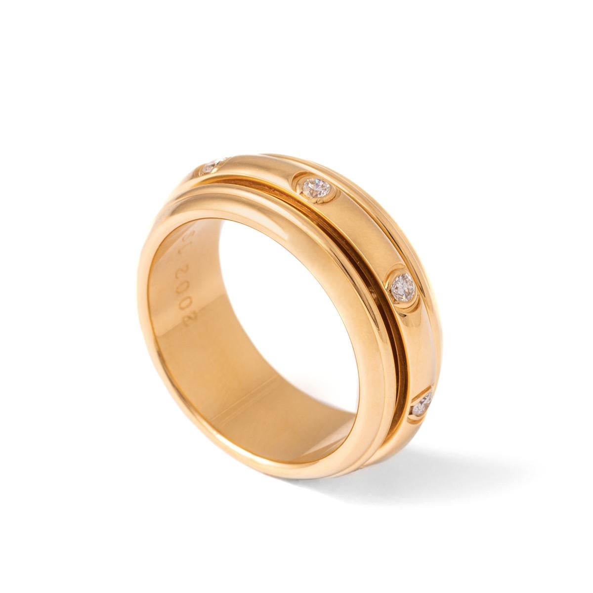 Piaget Possession Diamonds Yellow Gold band Ring.
Numbered A22101.
Signed Piaget.
Date 1991.
Ring size: 60.