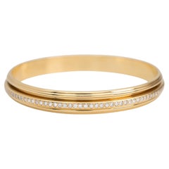 Piaget Possession Bangle rotante con diamanti e oro giallo 18 carati