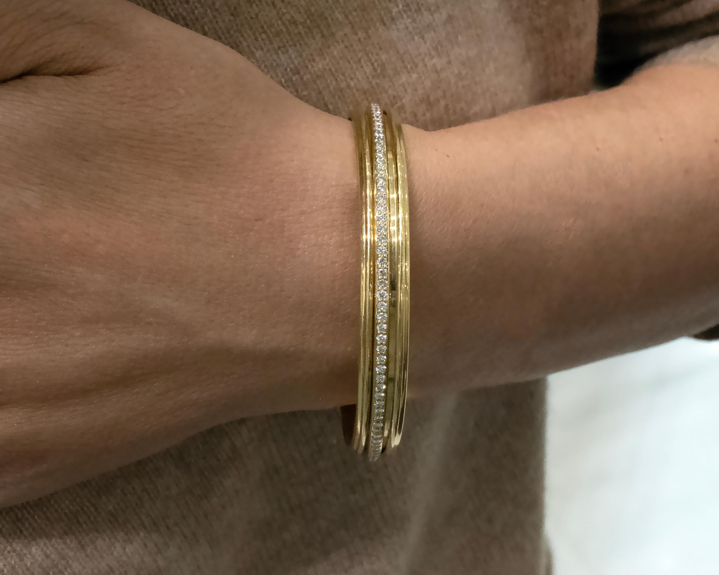 Taglio brillante Piaget Possession Bangle rotante con diamanti e oro giallo 18 carati in vendita