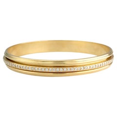 Piaget Possession Bracelet jonc tournant avec diamants et or jaune 18 carats