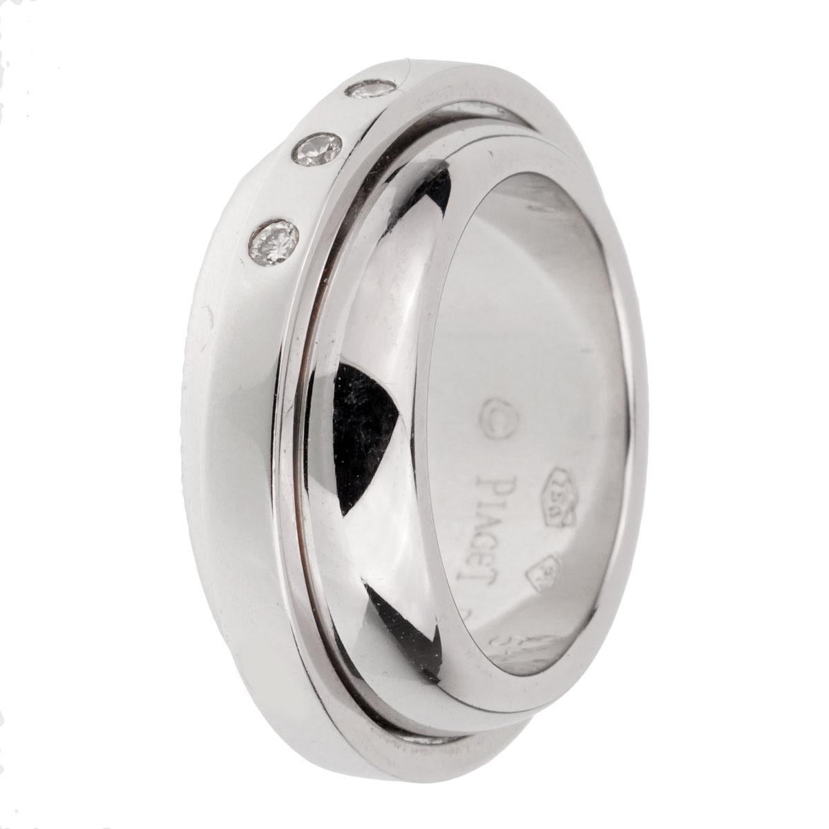 A chic Piaget Possession double band style ring crafted in 18k white gold, the ring features 3 round brilliant cut diamonds on the upper layer. The ring measures a size 5 1/2

Sku: 1922