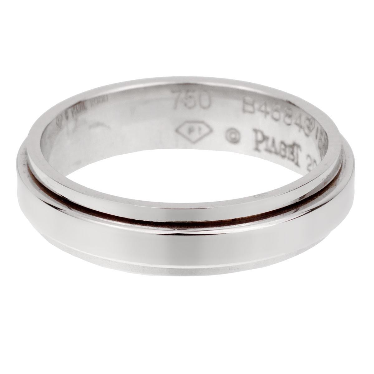 A chic band style ring by Piaget from the Possession collection featuring a spinning center band in 18k white gold. The ring measures a size 7

Sku: 1921