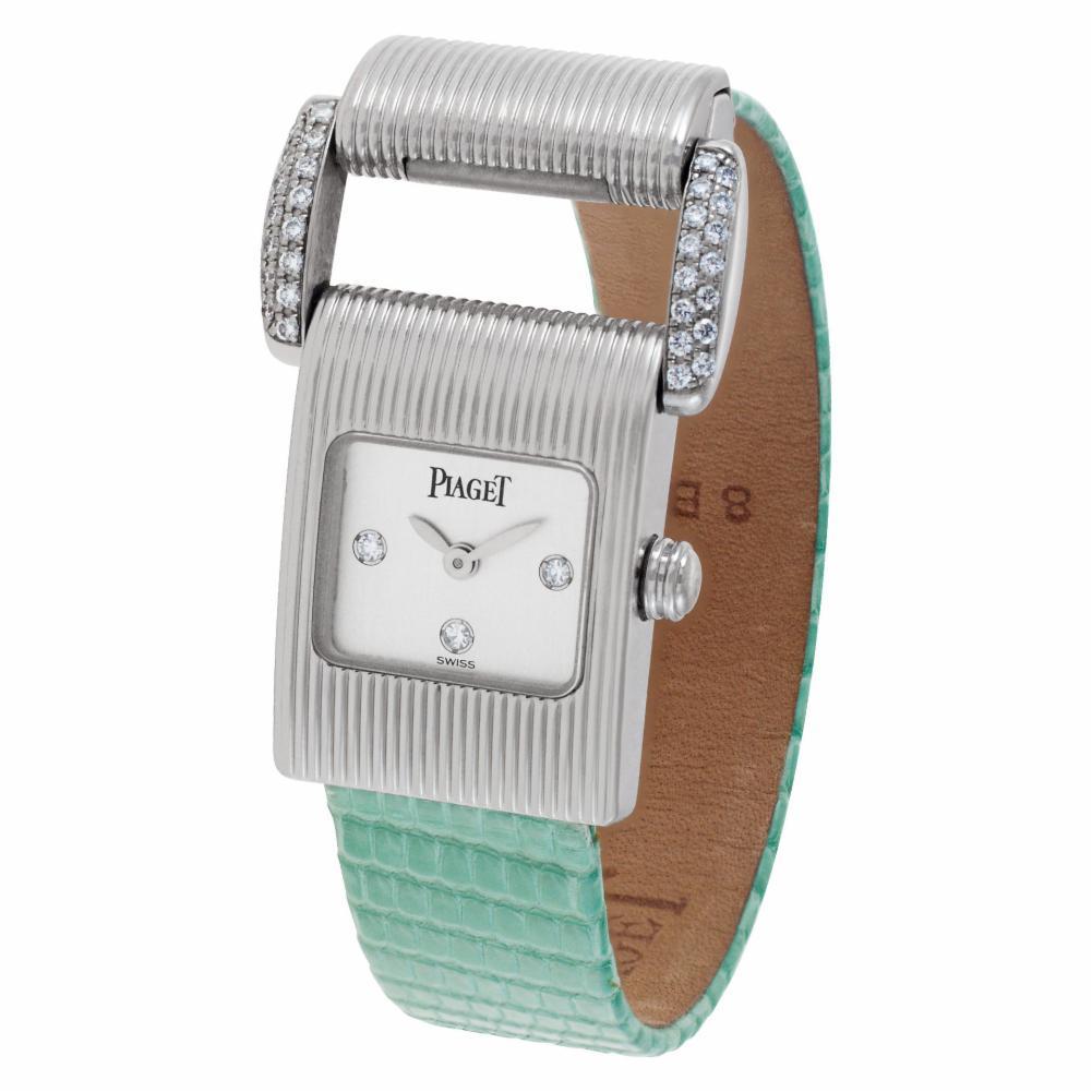 Piaget Miss Protocol in 18k white gold with original diamond dial and lugs on a teal lizard strap. Quartz. 17 mm case size. Ref 5222. Circa 1990s. Fine Pre-owned Piaget Watch. Certified preowned Dress Piaget Protocol 5222 watch is made out of white