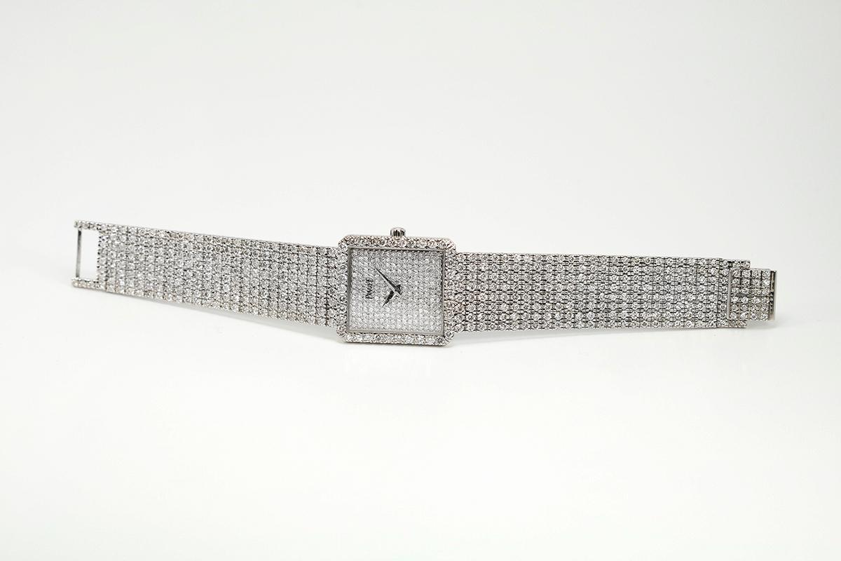 Piaget Protocole 18k white gold and diamond reference 9150 with caliber 9P2, 18-jewel manual wind movement. case measures 24.74mm wide x 27.08mm lenth, as for bracelet lenth see image on cone.