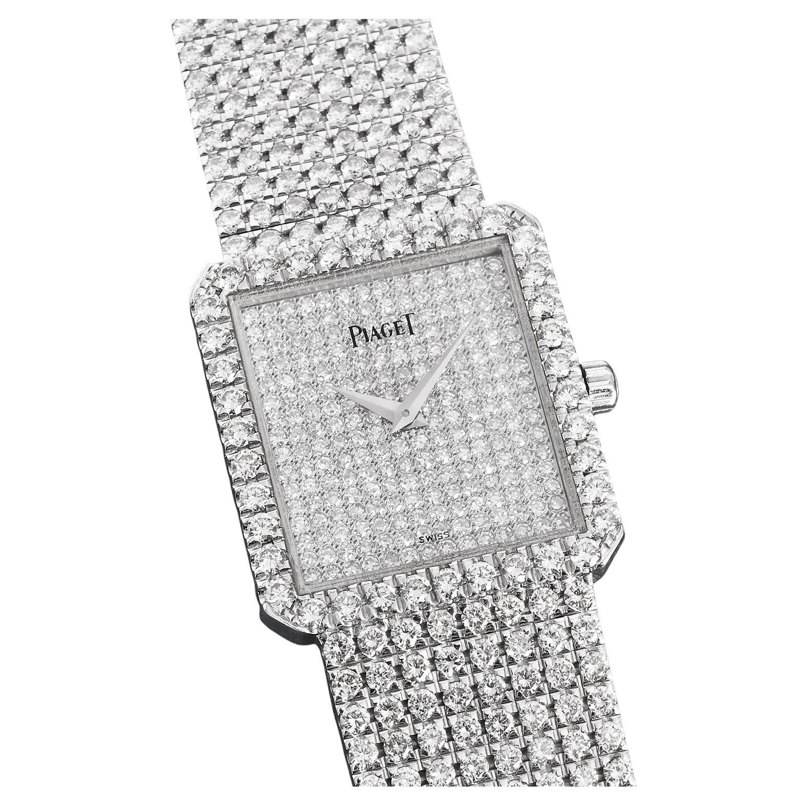Piaget Protocole Diamond Set Luxury Watch

Crafted with exceptional artistry, this Piaget Protocole watch from circa 1990 is a paragon of luxury, encased in 18K white gold and adorned with over 780 Factory-Set diamonds.

The watch features a square