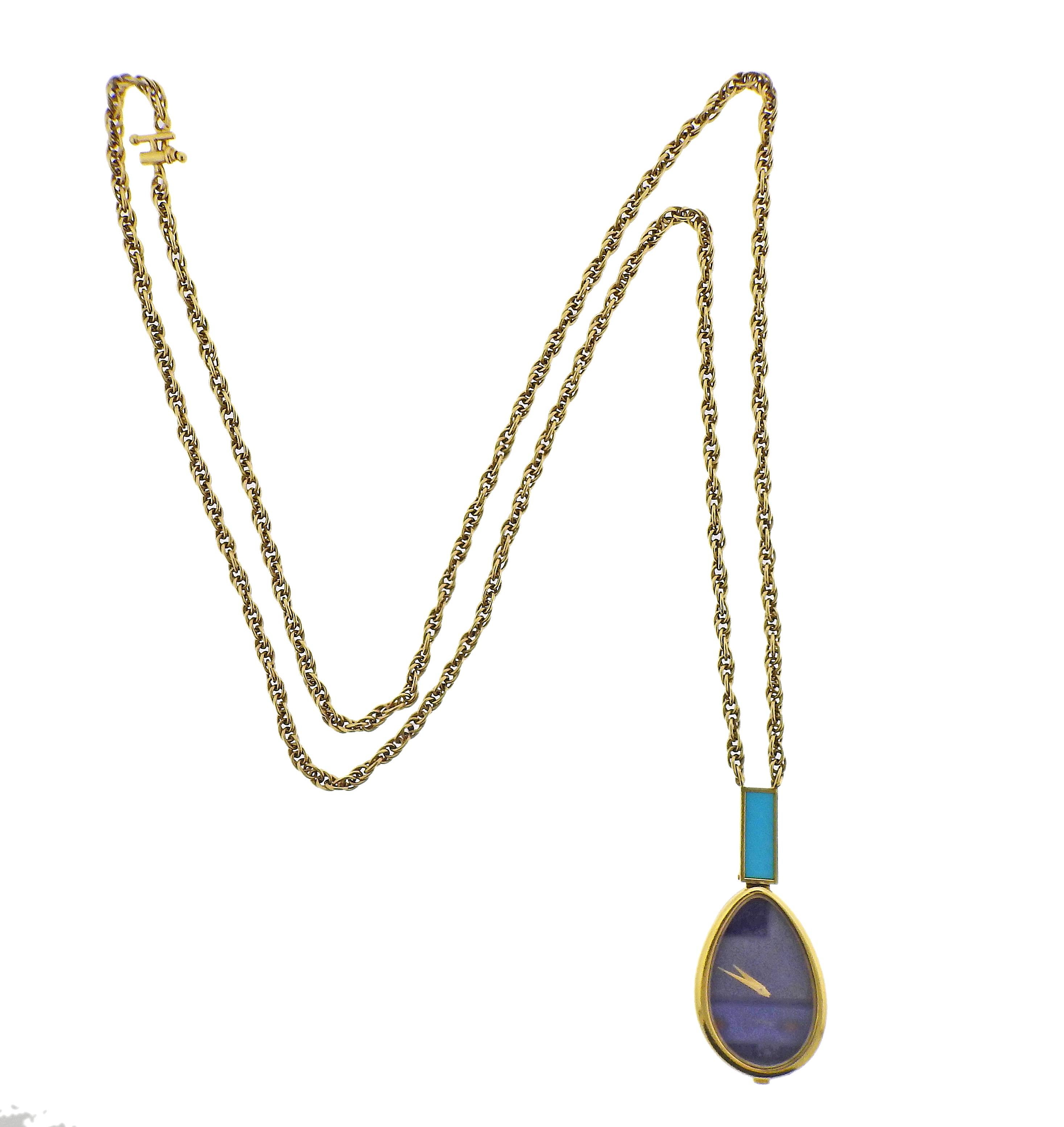 Rare 1970s 18k gold Piaget watch pendant necklace, with lapis lazuli dial and turquoise on the bale. Necklace is 34