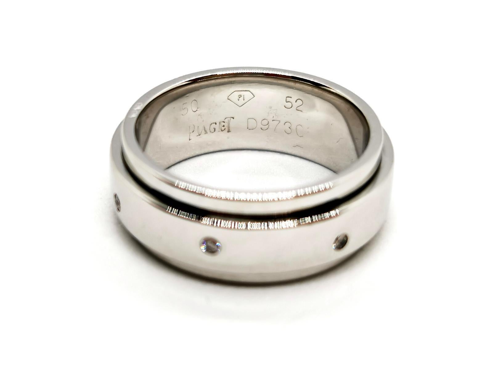 Ring signed Piaget. Possession collection. white gold 750 mils (18 carats). mobile ring set with 7 brilliant cut diamonds. ring size: 52. width: 0.72 cm. signed and numbered total weight : 8.74 g. owl punch Excellent condition
