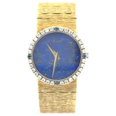 Piaget Round Cut Diamond & Sapphire Lapis Lazuli Ladies' Watch in Yellow Gold