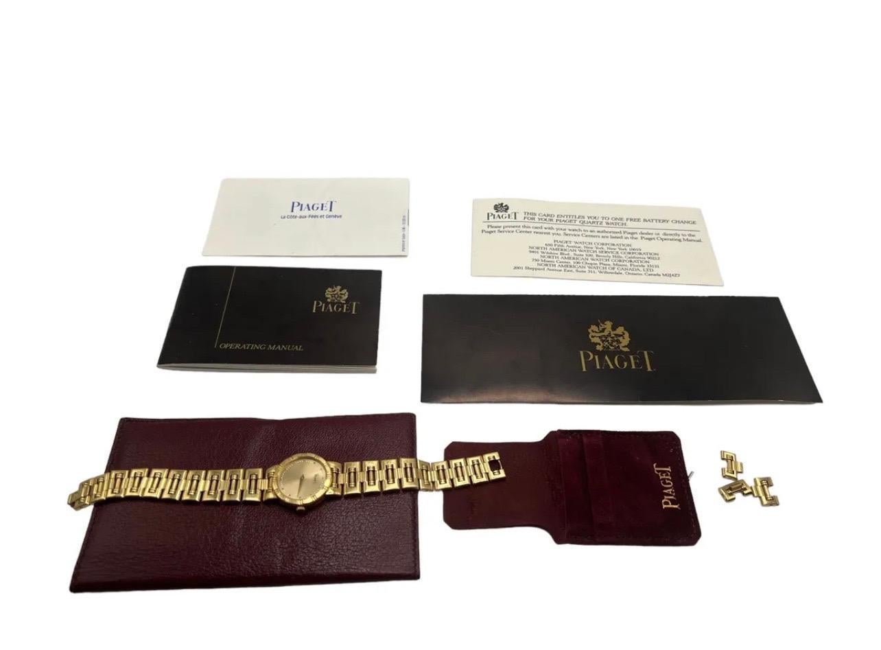 This exquisite Piaget Dancer wristwatch is crafted from solid 18K gold and comes with its original box and papers, making it a highly desirable timepiece for any collector. The analog display and brand name Piaget are testament to the quality and