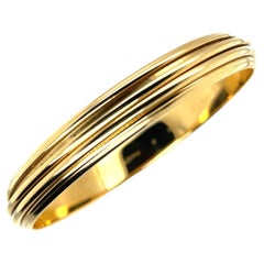Piaget Spinning "Possession" Bangle Bracelet in 18k Yellow Gold 