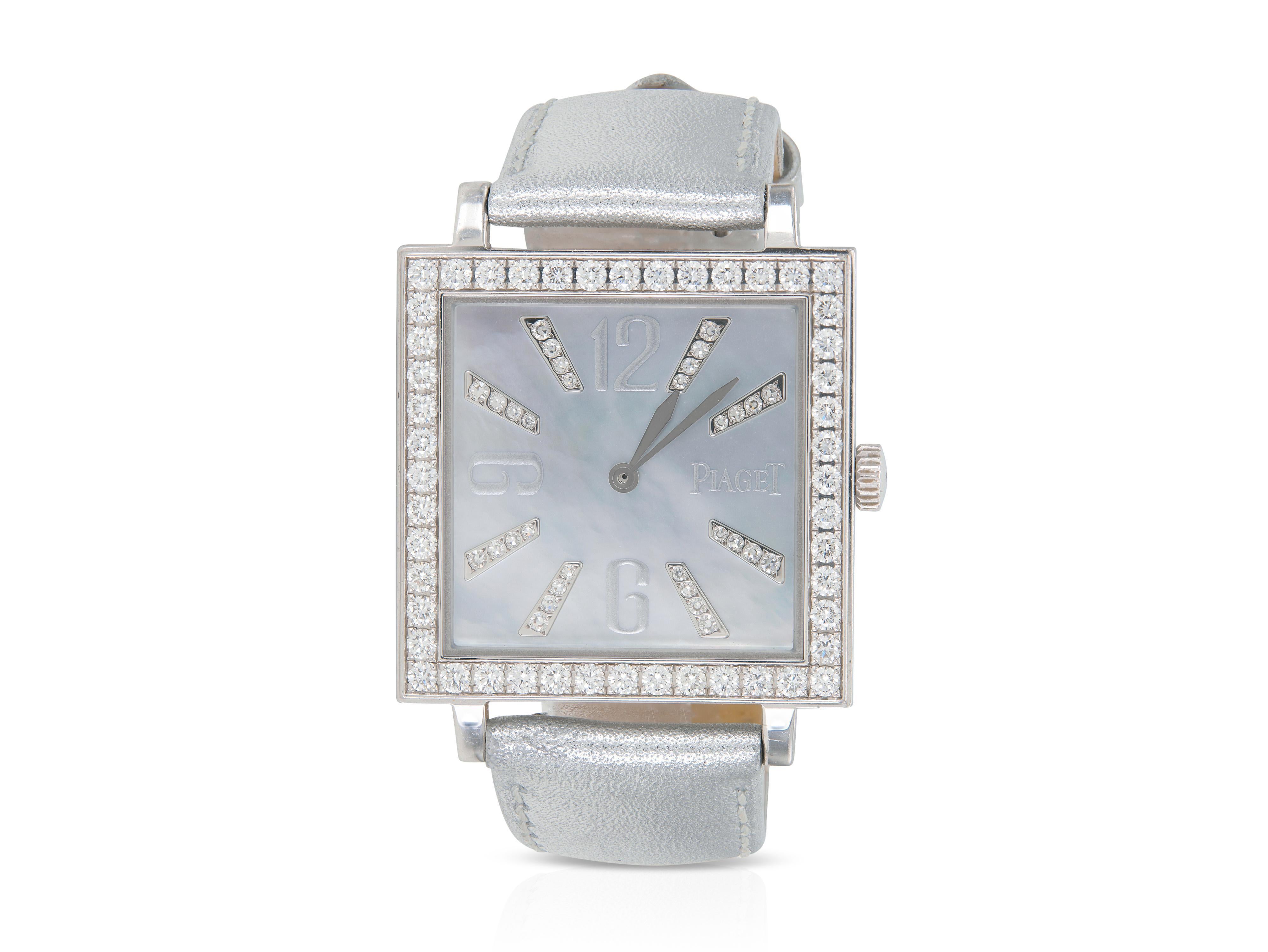 Finely crafted in 18k white gold with a Mother of Pearl face as well as Round Brilliant cut Diamonds on the bezel and Single cut Diamonds on the dial weighing approximately a total of 2.00 carats. The watch features silver leather straps.
Signed by
