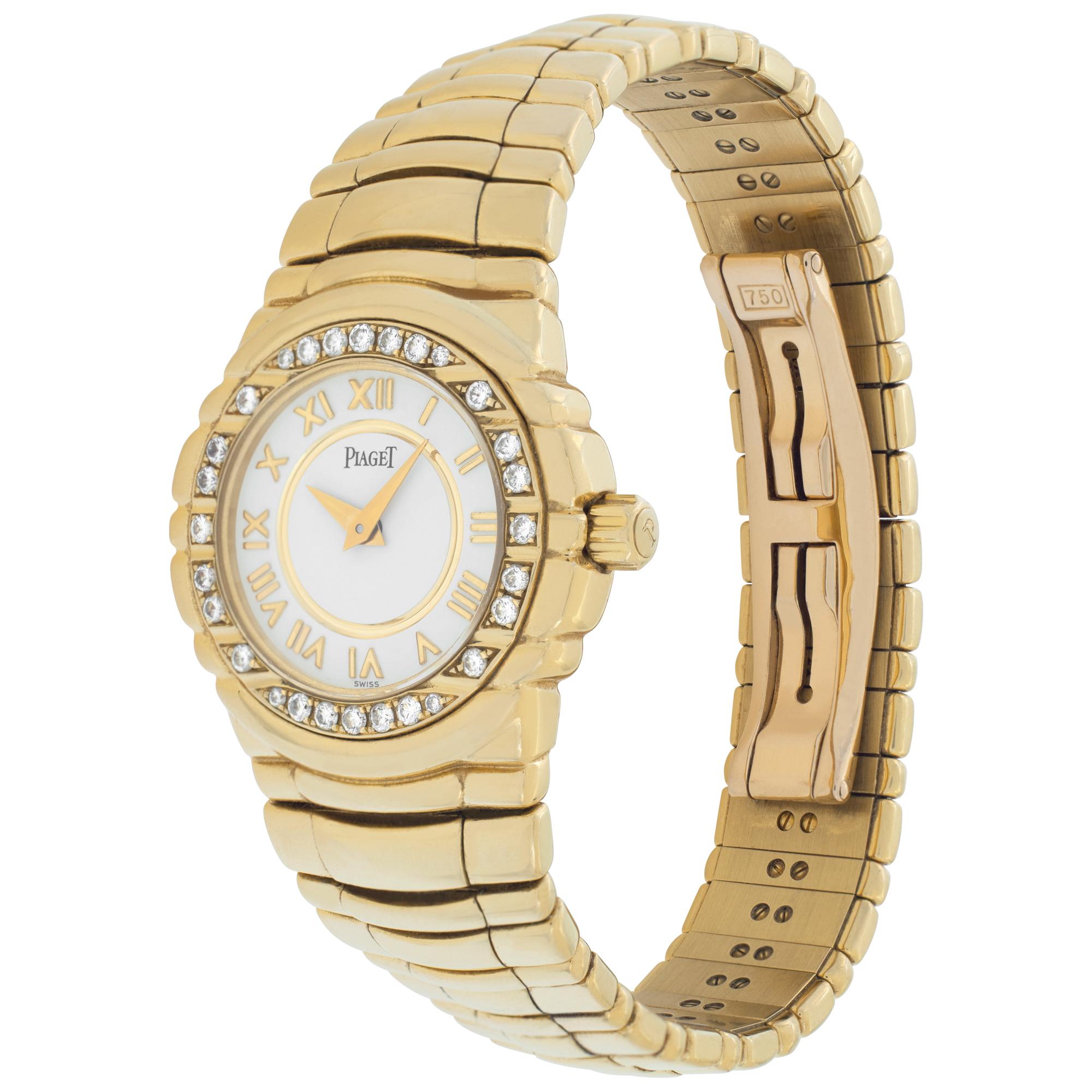 Piaget Tanagra in 18k yellow gold with original diamond bezel. White dial with gold applied Roman numerals. Quartz. 25 mm case size. Ref 16033 m 401 d. Circa 2000s. Fine Pre-owned Piaget Watch. Certified preowned Dress Piaget Tanagra 16033 m 401 d