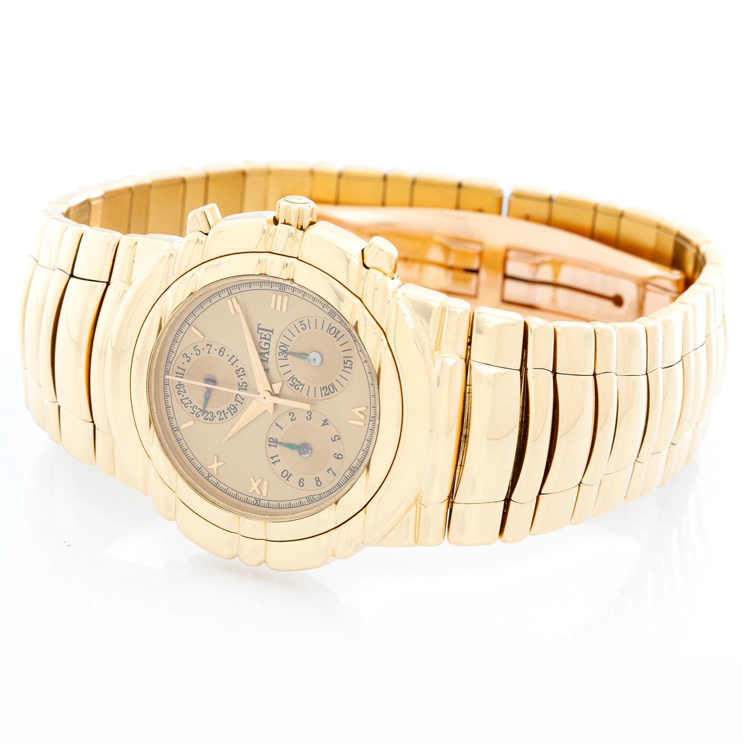 Piaget Tanagra Chronograph Yellow Gold Watch Ref 14081 - Quartz. 18K Yellow gold ( 33 mm ). Champagne dial with three subdials. 18K Yellow gold bracelet. Pre-Owned with box.