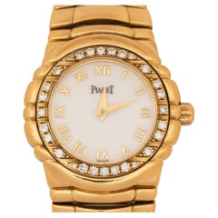 Reloj de señora Piaget Tangara engastado en bisel de oro amarillo de 18 quilates y diamantes