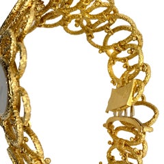 Piaget Vintage Cuff Watch in 18 Karat Yellow Gold with a Malachite Stone