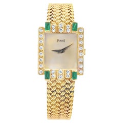 Piaget Vintage Round Brilliant Cut Diamond & Emerald 18K Yellow Gold Watch